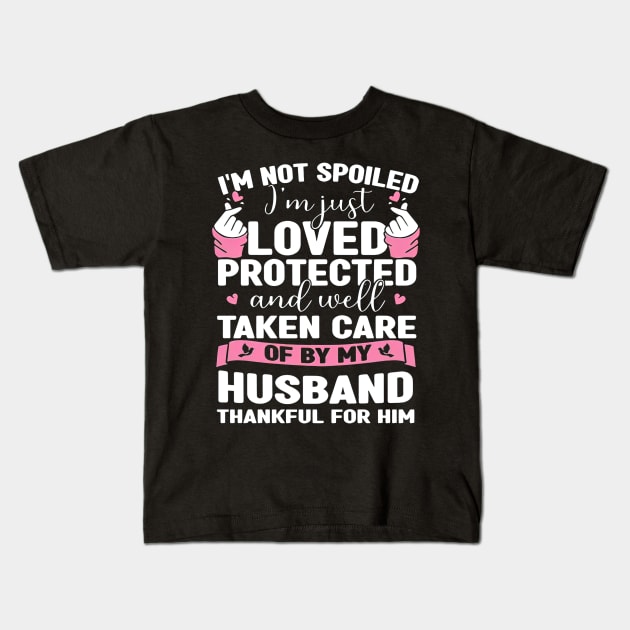 I'm Just Loved Protected And Taken Care Of By My Husband Kids T-Shirt by Gearlds Leonia